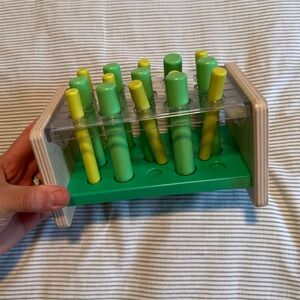 Green and Yellow Kids Peg Toy